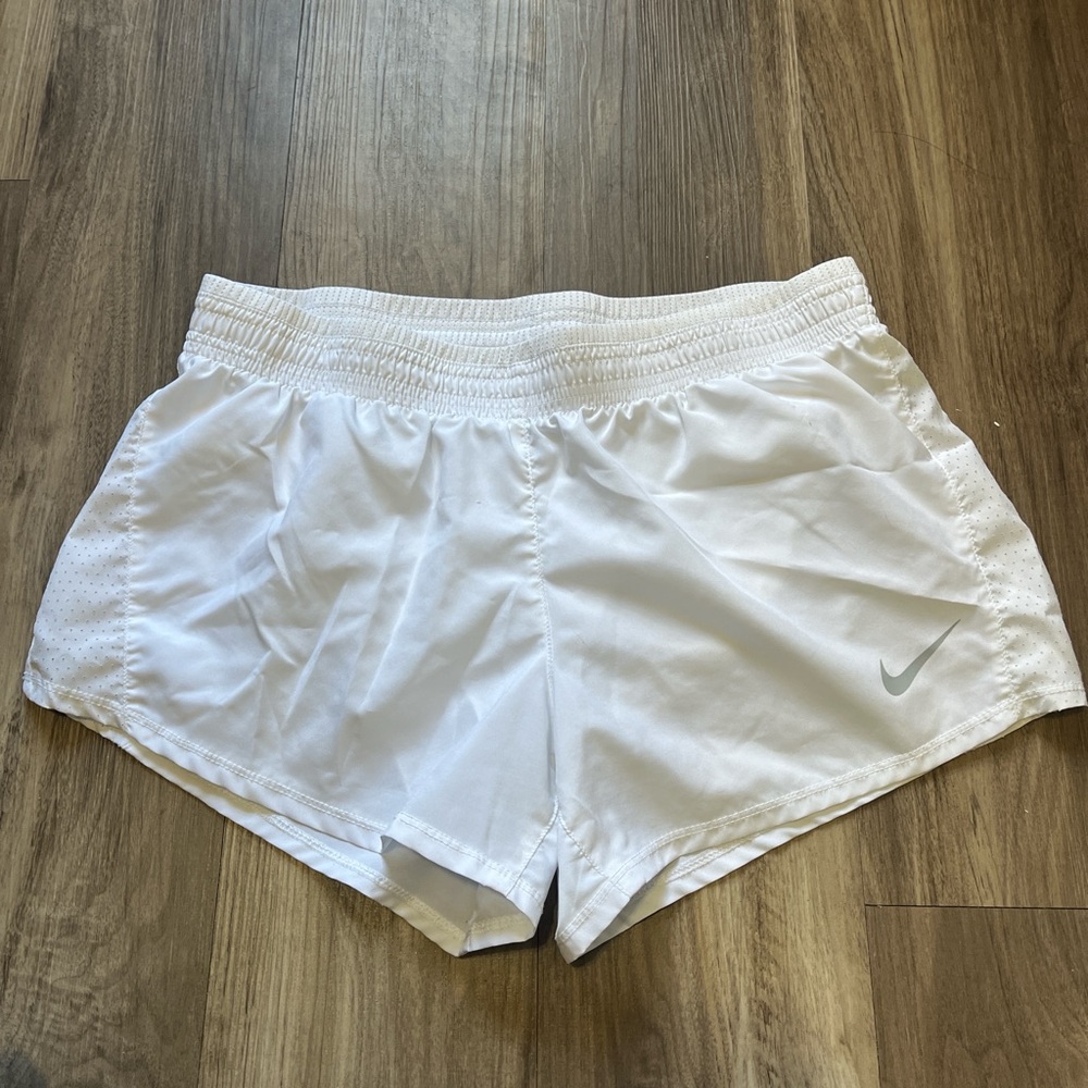 Nike Women's White Athletic Shorts with Gray Logo